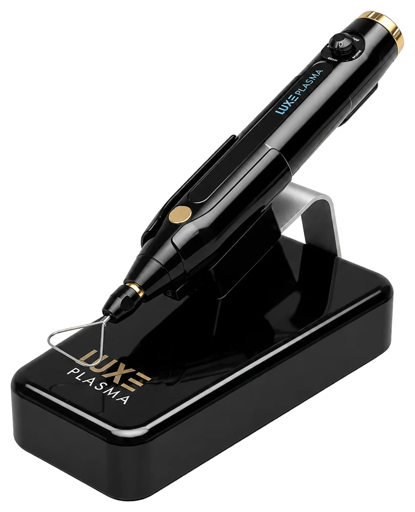 The LUXEplaxel plasma pen with the PlasmaChanneling tip, on its charging base