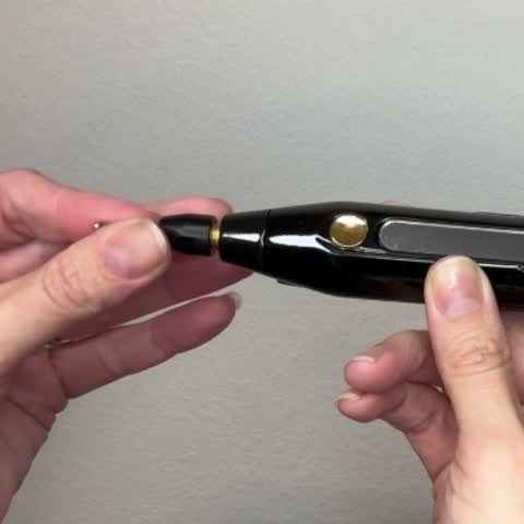 The Fine Line Eraser ball tip going onto the LUXEplaxel